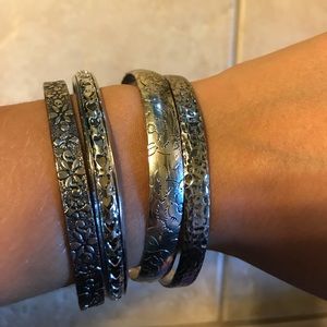 Stainless steel dangling bracelets